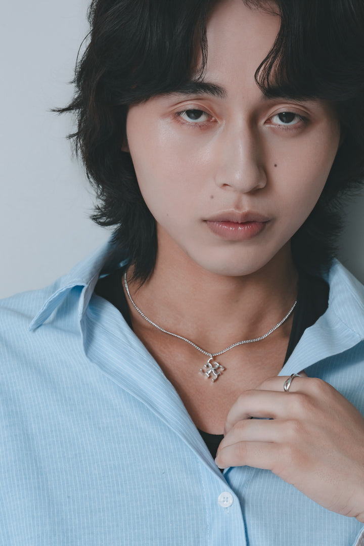 Crossed ring