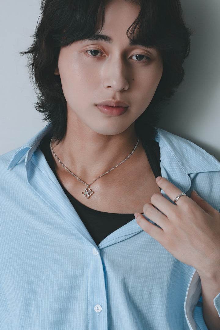 Crossed ring