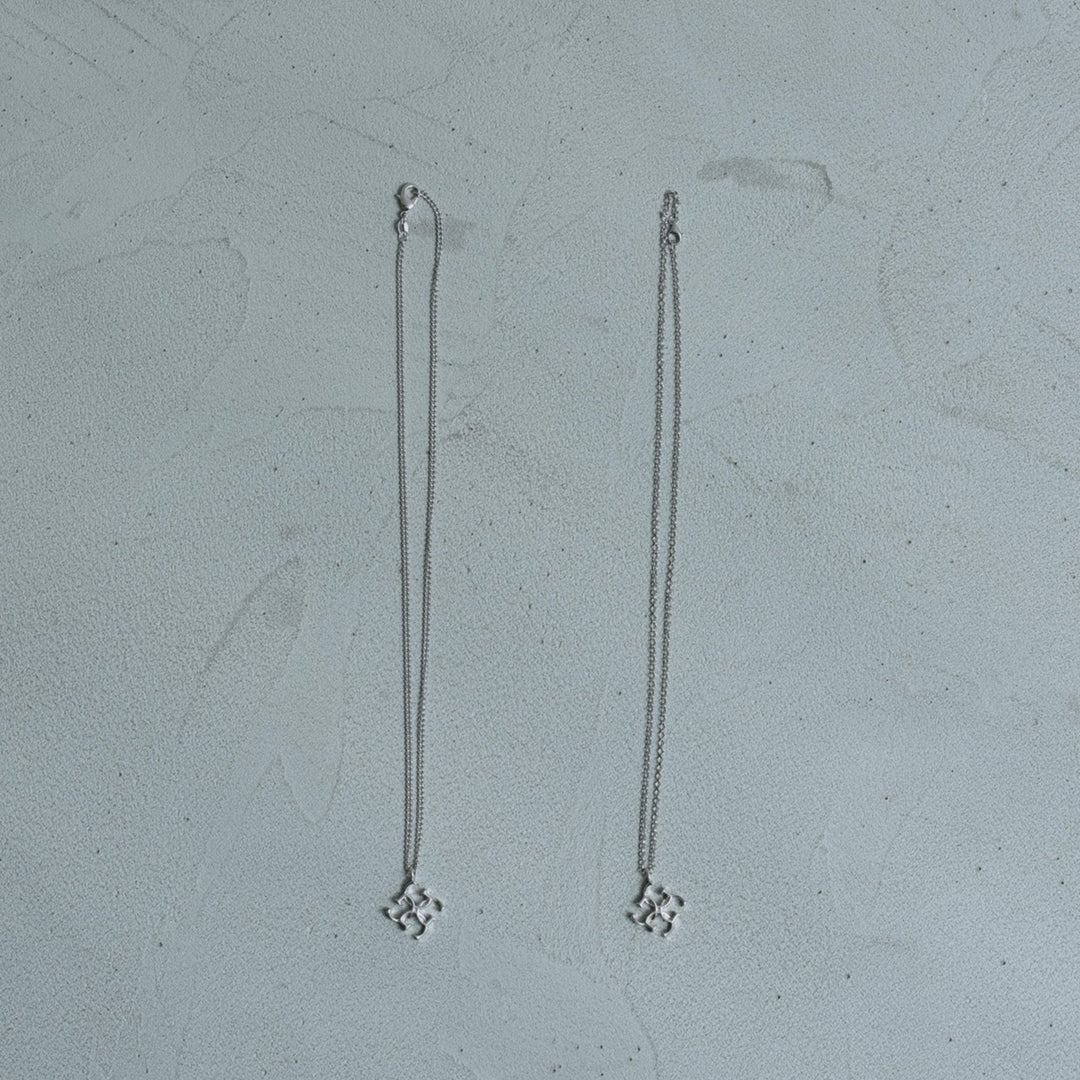Cross logo necklace - white silver