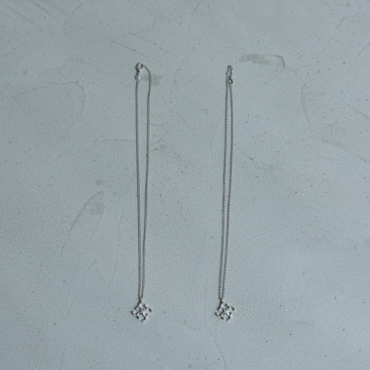 Cross logo necklace - white silver
